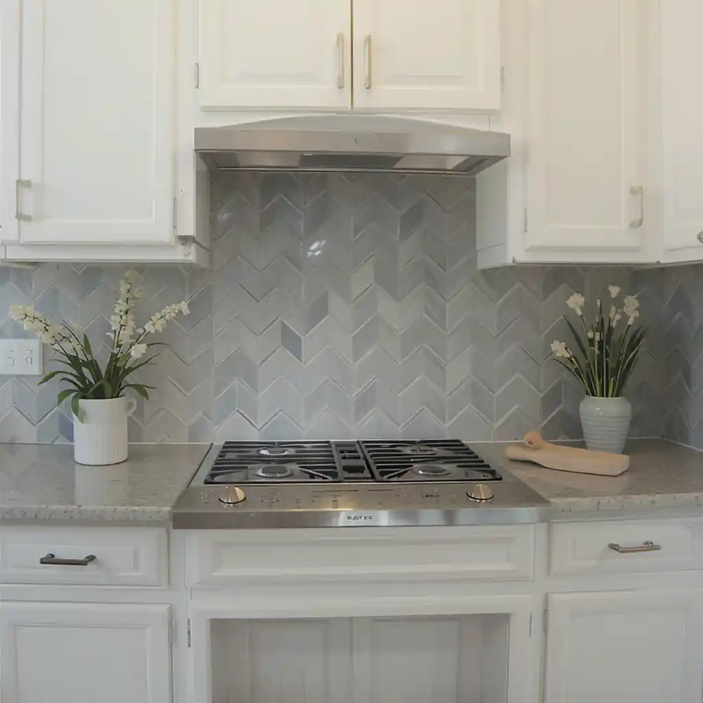 White Cabinets with Chevron Backsplashes
